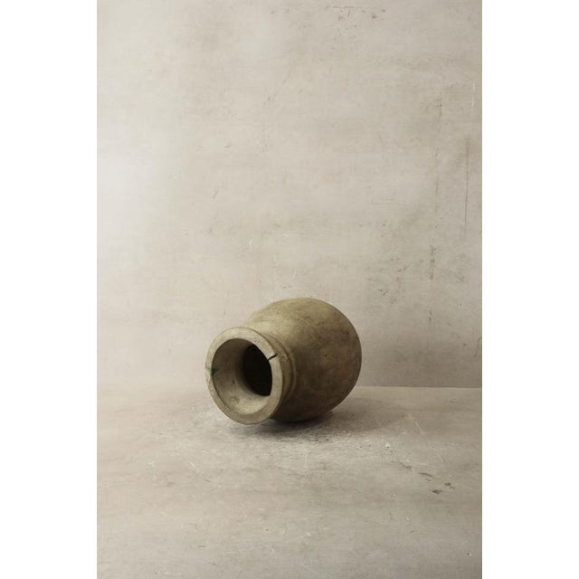 A vintage teak vase is a timeless masterpiece crafted from teak wood, known for its rich grain patterns and lustrous...