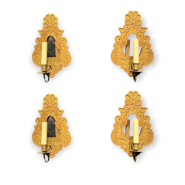 A set of late 19th century Italian gilt wood one light sconces with mirror center. Two pair available \ price per pair