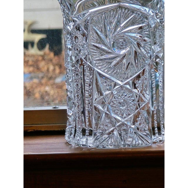 A striking antique American Brilliant Period (ABP) cut glass pitcher, showcasing the depth, precision, and sparkle that...