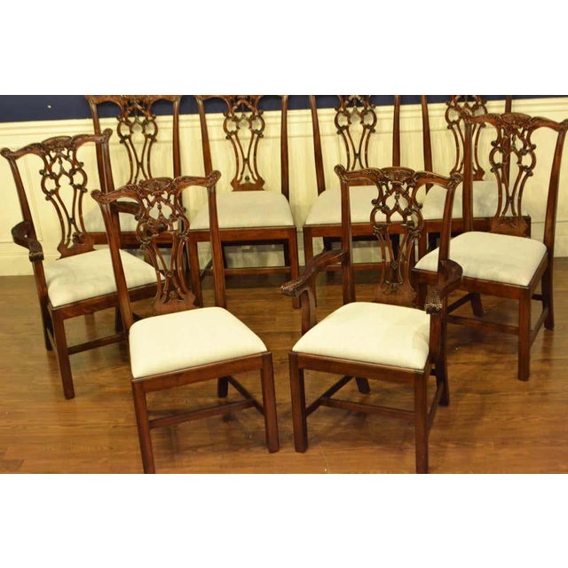This is a set of eight mahogany Chippendale straight leg dining chairs by Leighton Hall. They are the James chairs. They...