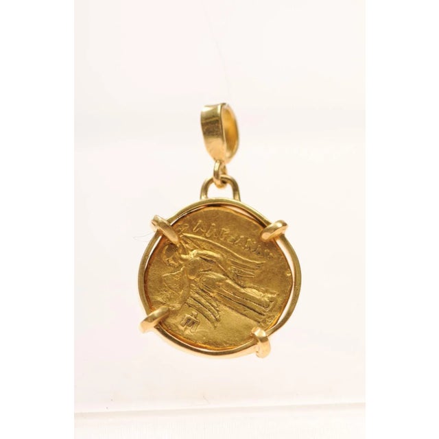 A truly remarkable and rare Greek Gold Stater Coin from the Kingdom of Macedon, minted at Amphipolis, or Philippi, Circa...