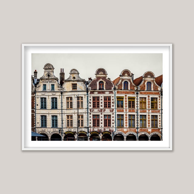 An architectural study of five adjoining houses in the northern French town of Arras. They stand along Place des Héros,...
