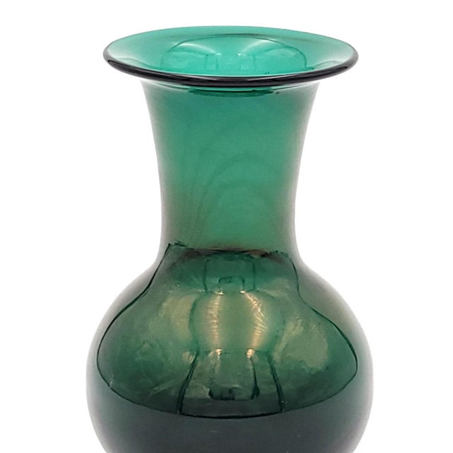 A green glass vase, Italy circa 1960.