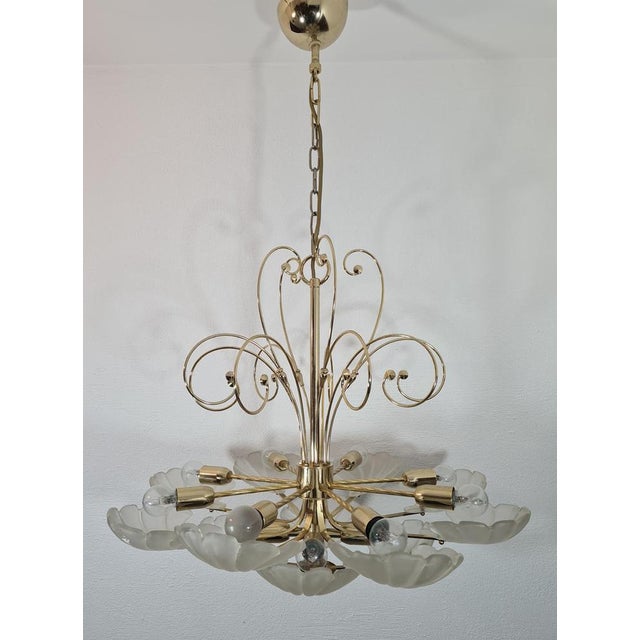 An impressive vintage chandelier from the 1970s, manufactured by the Belgian company Deknudt, known for its high-quality...