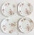 A beautiful set of antique Haviland Limoges porcelain dinner plates featuring delicate hand-painted honeysuckle blossoms....