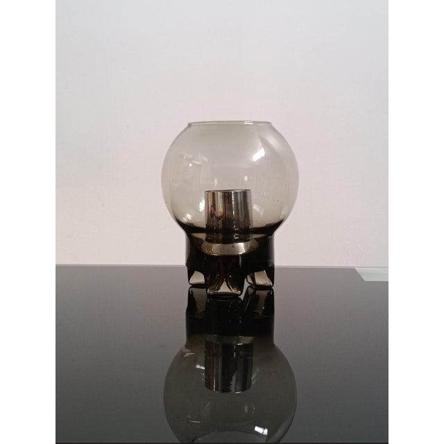 Beautiful table lamp by Sussmuth Leuchten. Germany, 1970s. All smoked clear glass, tripod base. The lamp holder is chrome-...