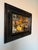Elegant Baker for Milling Road wall mirror featuring a substantial black ebonized wood frame with layered stepped molding...