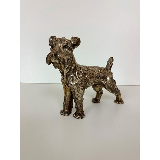Made in Italy by Spigarolo, 1950s. This sculpture is made in ceramic and copper covered in silver. It might show slight...
