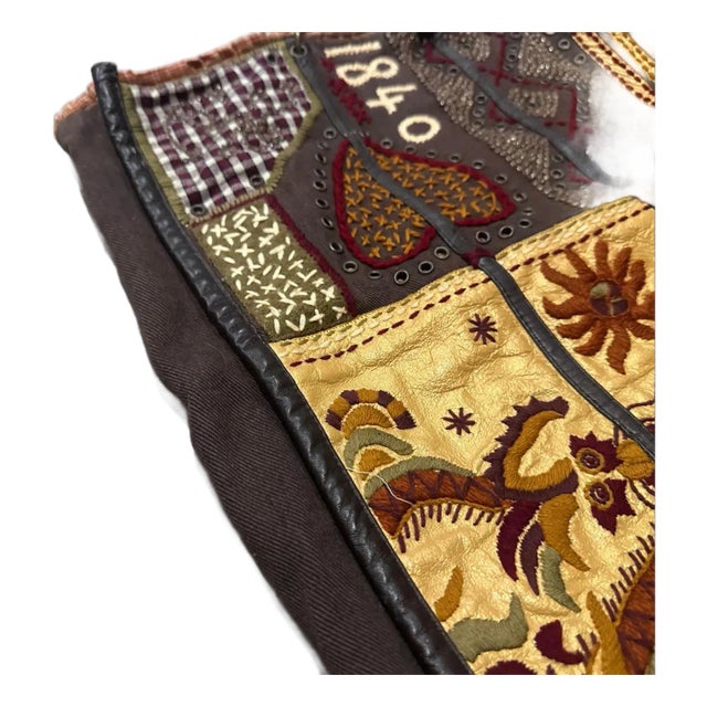 This rare 1990s hand-crafted tote bag by the celebrated French design house Jamin Puech is a masterpiece of bohemian...