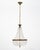 Antique chandelier from France made with cut crystal elements of cabochons and pendants. They are displayed on a brass...