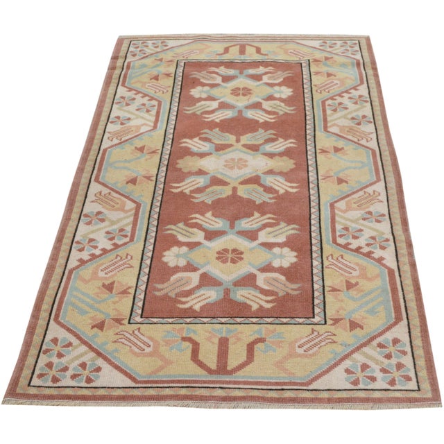 Hand-knotted with care using traditional rug making techniques, this wool rug blends timeless craftsmanship with a modern...