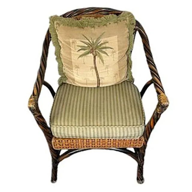 Set of 3 armchairs made with Barley Twist Ebonized rattan frame and cane backrest and woven cane over wooed seat. The...