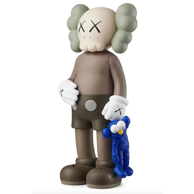 This is a brand new piece in perfect condition. Kaws share (brown version), new & unopened in its original packaging: kaws...