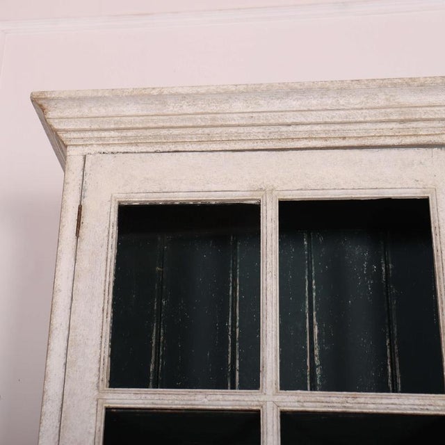 Pretty 19th C English painted narrow pine bookcase. 1860 23cm shelf depth This piece is designed in the style of the...