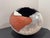 Statement-scale sculptural studio pottery vessel in an organic “pod” form with a dramatic cutout opening. The surface...