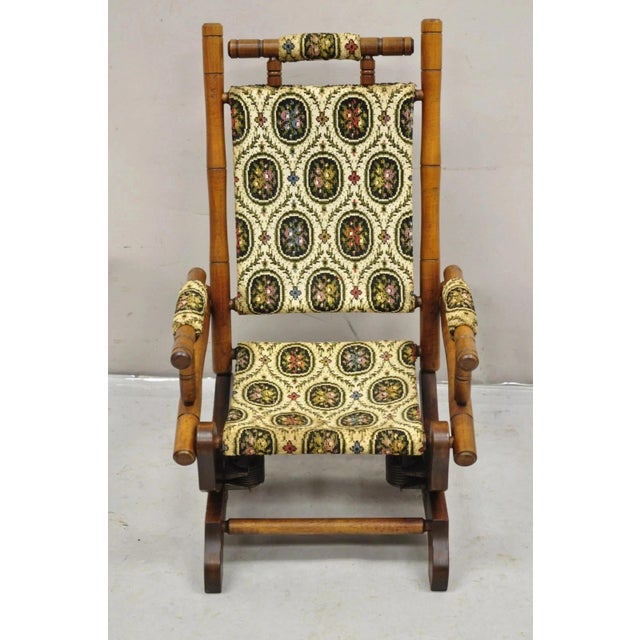 Antique Victorian Small Child's Maple Wood Platform Rocker Rocking Chair. Item features floral tapestry upholstery,...