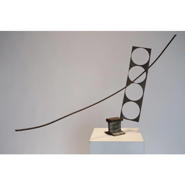 Found object abstract steel table top sculpture by Colorado artist. Photographed with Bertoia side chair and Eames LTW for...