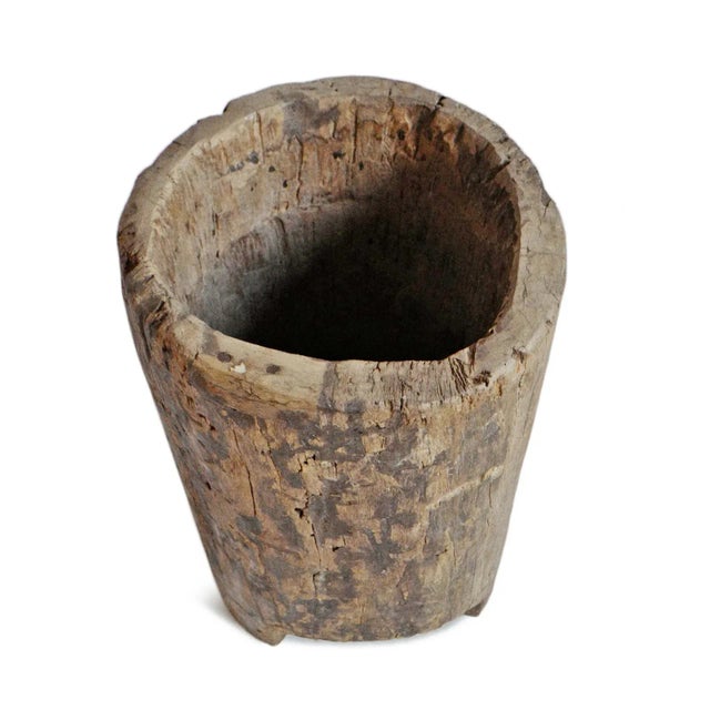 Old Naga rustic wood trunk carved into a sturdy pot. Beautiful signs of age and use. Each is unique and sold individually.