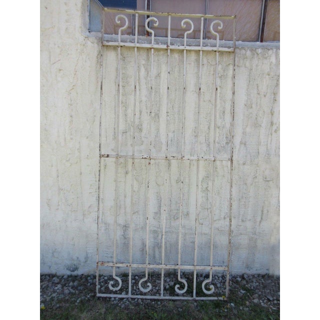 A piece of architectural salvage. Heavy and sturdy. Piece does show signs of age related wear including rust, flaking...