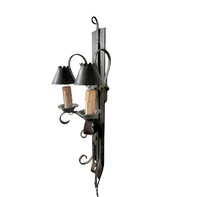 A striking example of Brutalist craftsmanship, this vintage hand-forged iron and pewter wall sconce combines sculptural...