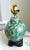 Lotus Lamp With Vintage Jute Shade A beautifully detailed petite lotus‑motif porcelainlamp paired with a vintage woven...
