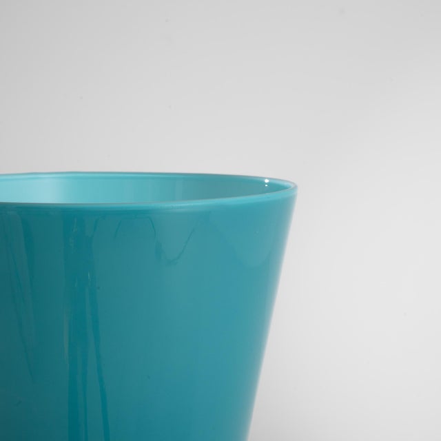 Elevate your dining experience with this stunning Italian Teal Glass Goblet from the 1960s, a true gem for collectors and...