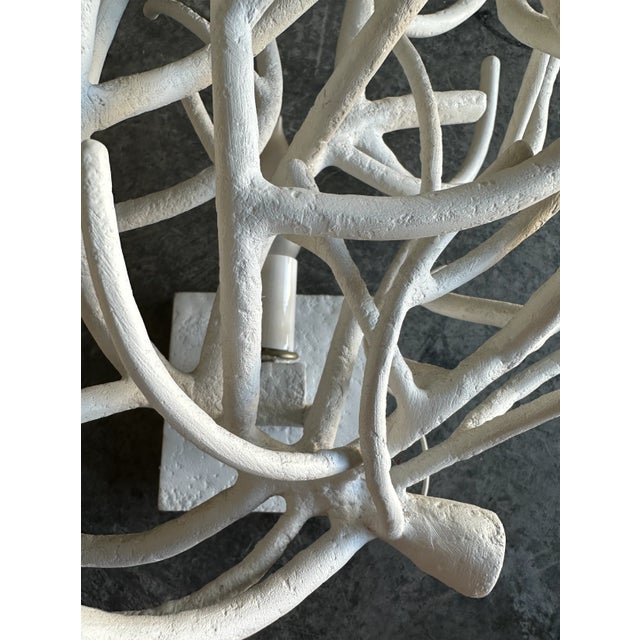 Sconce made of hand applied plaster over powder coated metal branches looking like coral. Exquisite plaster finish. Very...