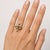 Keith Davis 14k yellow gold Pendant that converts to a ring, set with 0.10 carats of round brilliant diamonds and one...