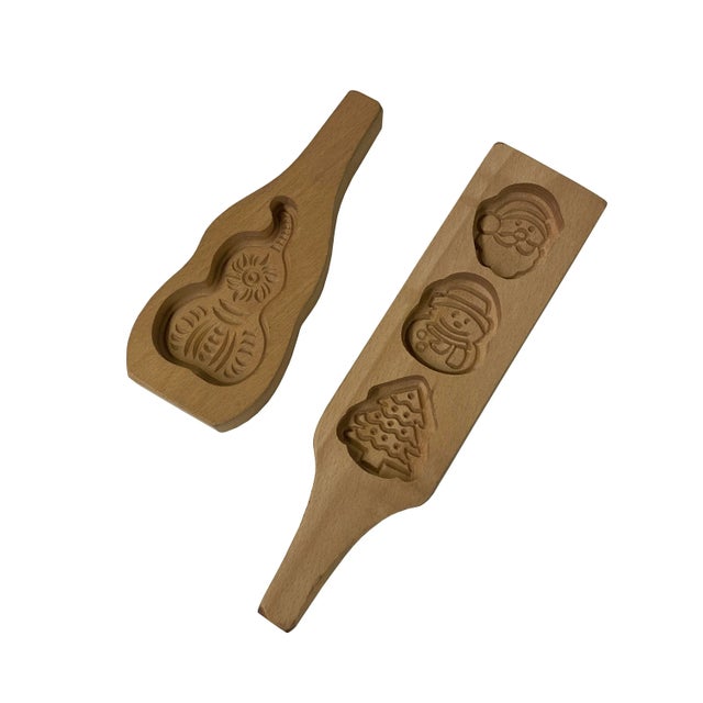 This is a set of 2 cake-making / soap-making mold boards carved from wood and finished in natural light wood tan color. It...
