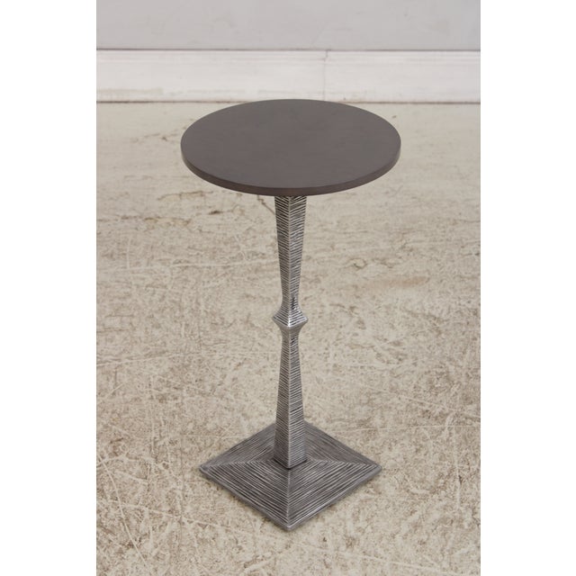 Age: Approx. 5 Years Old Details: Distinctive Tapered Metal Pedestal Base Sleek Dark Round Top Modern Brutalist Design...