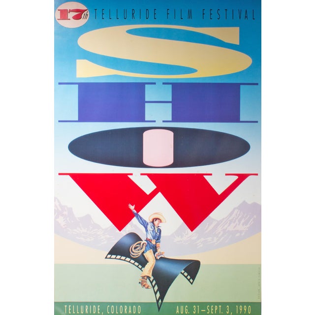 A 1990 poster for the Telluride Film Festival. The poster features vibrant colors and a cowboy riding a film strip.