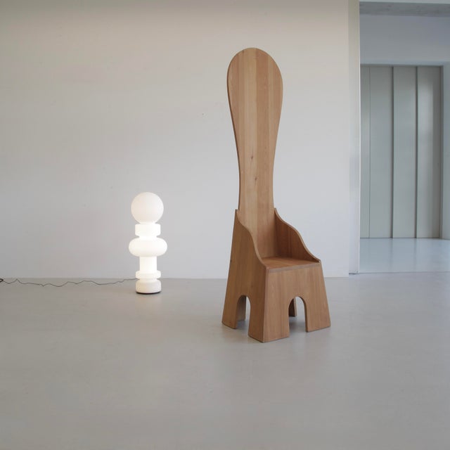 Two 'fratina' chairs by mario ceroli, produced by mobili nella valle for poltronova. Unrefined russian pine, stamped on...