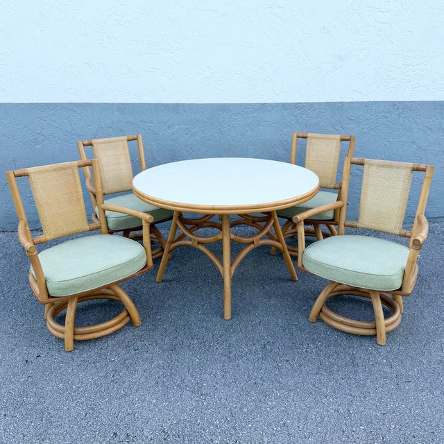 A beautifully crafted boho chic dining set that blends coastal sophistication with relaxed tropical style. This five-piece...