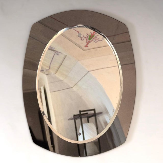 Mid- Century Modern Beveled Glass Wall Mirror, Italy 1970s A 1970s beveled mirror manufactured in Italy in the 1970s...
