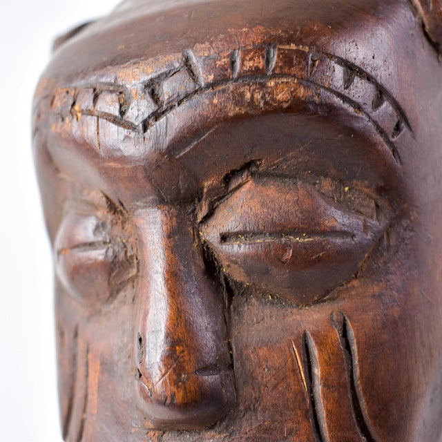 This Ndengese Figure from Congo is a remarkable Ndengese sculpture, portraying a dignified and authoritative male with...