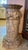 Beautiful Italian marble pedestal, dark veining throughout. Octagonal tiered base, cylindrical trunk and carved grapevine...