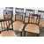These eight Regency-style chairs are made from solid mahogany with a restrained design that showcases the beauty of the...