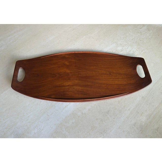 "1950s vintage teak large Dansk surfboard shape serving tray by Jens Quistgaard. Solid teak construction, made in Denmark,...