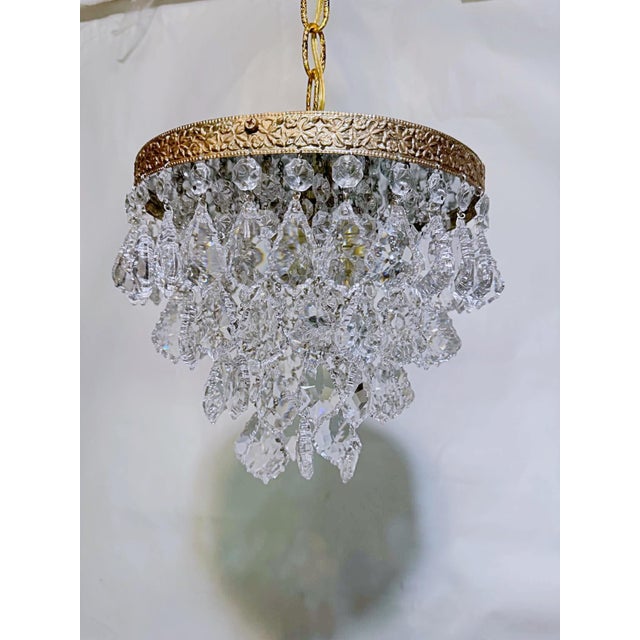 Introduce romance and rich vintage texture to your home with this enchanting mid-century tiered brass French drop crystal...