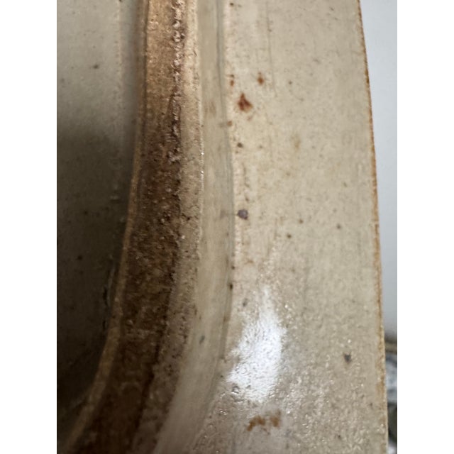 This tray is an example of Norstad’s distinct, abstract expressionist designs, featuring organic earth-toned iron and...