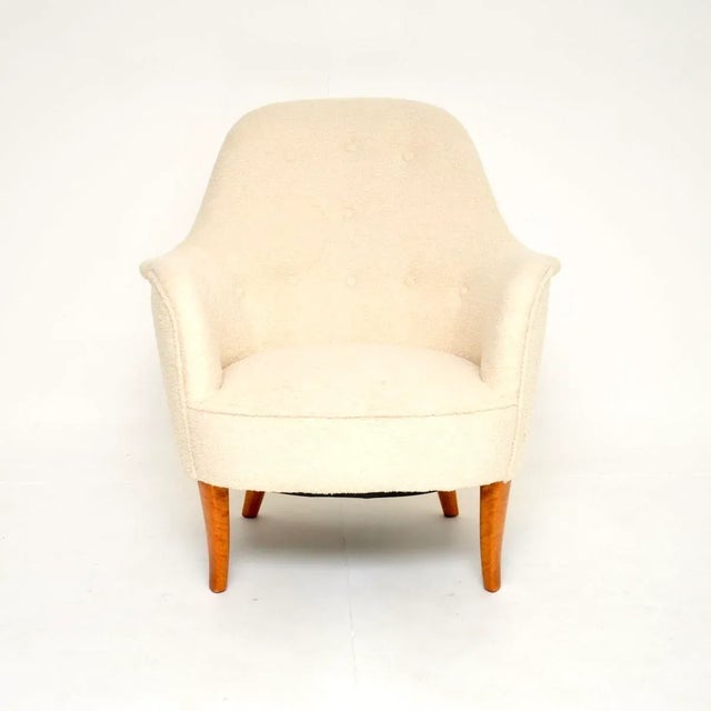 A stylish and iconic vintage Swedish Cirkus armchair by Carl Malmsten. It was made in Sweden, it dates from around the...