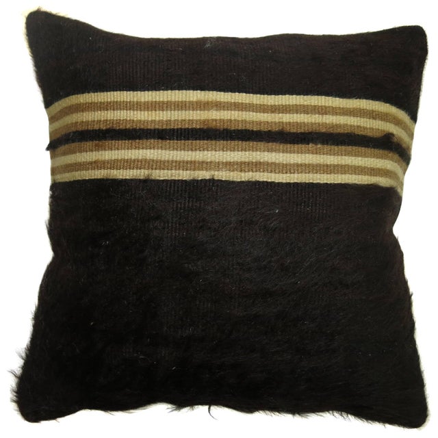 A pillow made with a Turkish Mohair rug. 1'3' x 1'3''