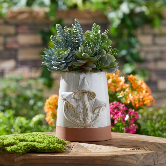 Bring a touch of the woodland into your home with the Tapered Porcelain Planter with Mushrooms Set. Featuring a cool grey...