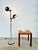 Double spotlight floor lamp from the Spanish brand FASE, with two independently adjustable heads. Brushed steel and matte...