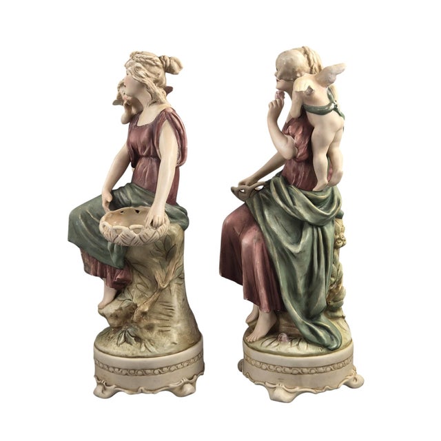 An important pair of Royal Dux Bohemia Art Nouveau figures modelled by Hermann Schubert in 1912. The mirrored compositions...