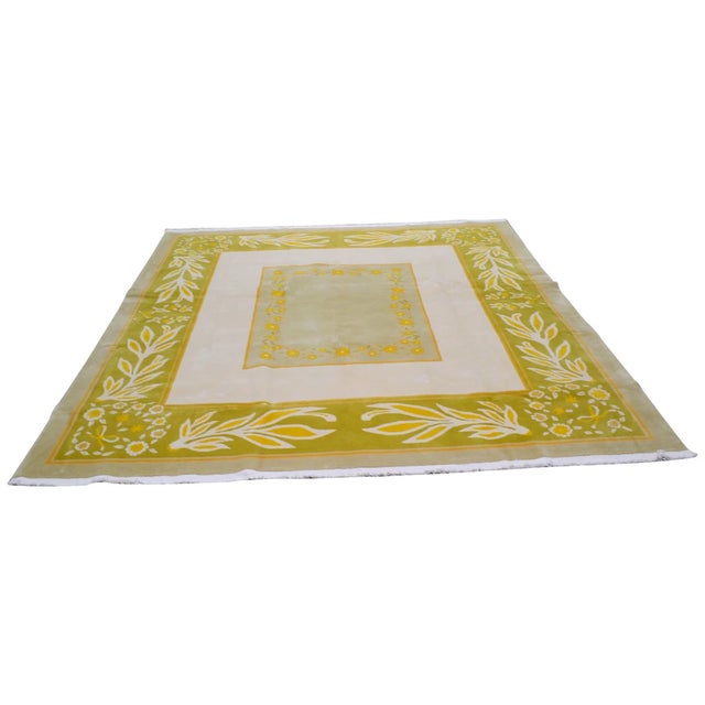 Hand-knotted with care using traditional rug-making techniques, this wool rug blends timeless craftsmanship with a modern...