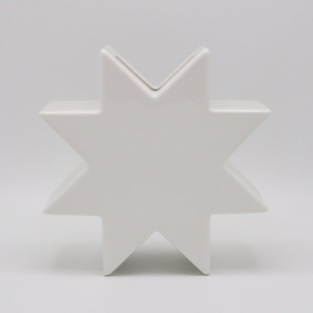 Hsing' vase designed by Ettore Sottsass for Alessio Sarri , Sesto Fiorentino. White glazed ceramic. Marked: E. Sottsass,...