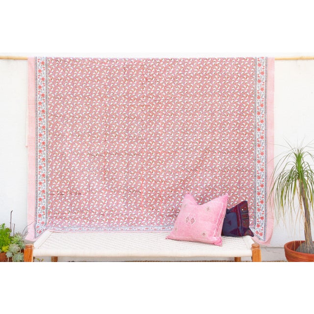 Drift into dreams with the serene beauty of our light Indian coverlet, a charming centerpiece for your bedroom decor....