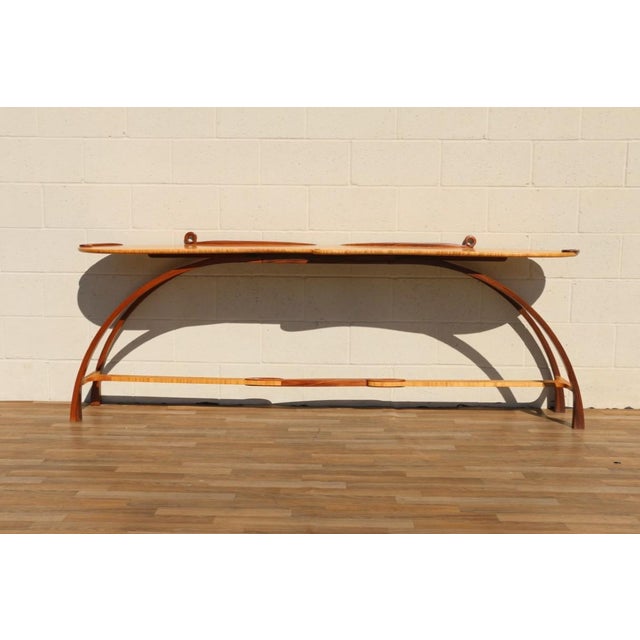 Stunning Mid-Century Modern sculptural console table, circa 1980s, crafted in a striking combination of Bird’s-Eye Maple...