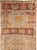 This mid-20th-century Turkish Anatolian runner presents a distinctive compartmentalized design arranged across a warm...